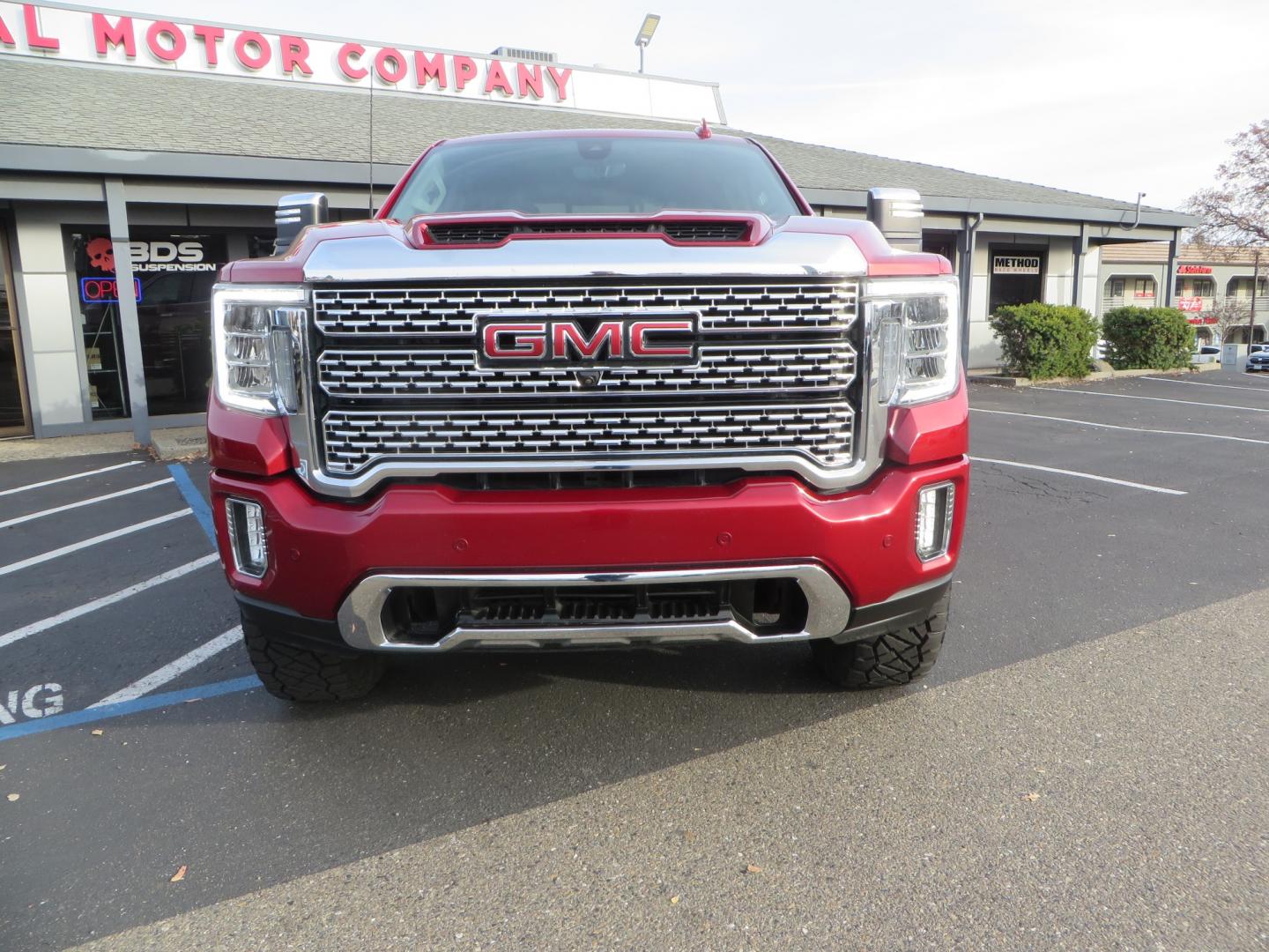 2021 MAROON /BLACK GMC Sierra 3500HD Denali (1GT49WEY1MF) with an Duramax 6.6L Turbo Diesel engine, 10 speed transmission, located at 2630 Grass Valley Highway, Auburn, CA, 95603, (530) 508-5100, 38.937893, -121.095482 - Duramax sitting on a BDS level kit with upper control arms and Fox shocks, 20" XD wheels, and 35" Nitto Ridge Grappler tires. - Photo#1